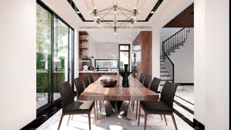 Trong thiết kế không gian phòng ăn biệt thự theo xu hướng hiện đại, sự có mặt của đèn không chỉ để chiếu sáng mà còn có hiệu ứng thị giác kích thích sự vui thú mỗi khi các thành viên sum vầy. Trong đây kts Morehome đã sử dụng ý tưởng dùng đèn chiếu sáng dạng lục giác với 6 đỉnh tựa như bông hoa đang bung nở khoe sắc, và sẽ đẹp hơn nếu thể hiện đúng thời điểm, và hiển nhiên trong mỗi gia đình hiện đại, trong 1 ngày làm việc bận rộn thì bữa tối lại là bữa chính và quan trọng nhất để nghệ thuật ánh sáng được phát huy tác dụng của mình.